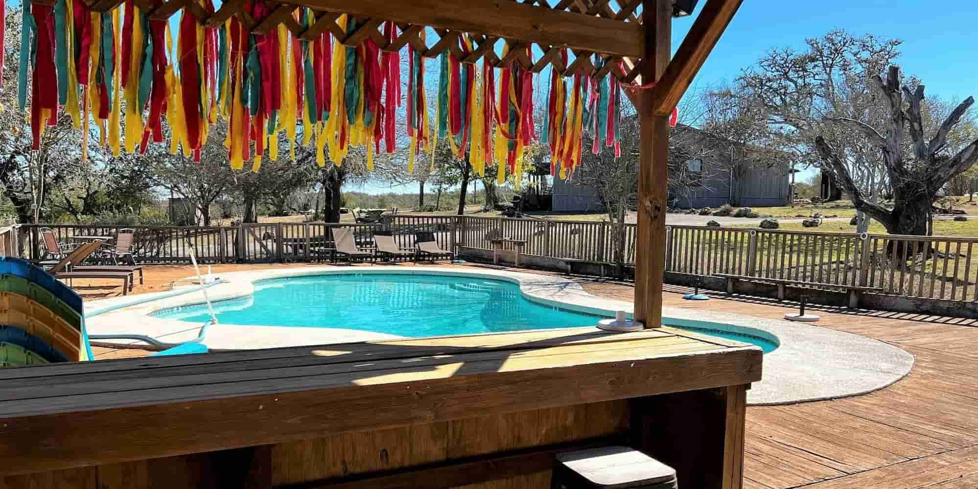 The ranch swimming pool viewed from over the cabana countertop